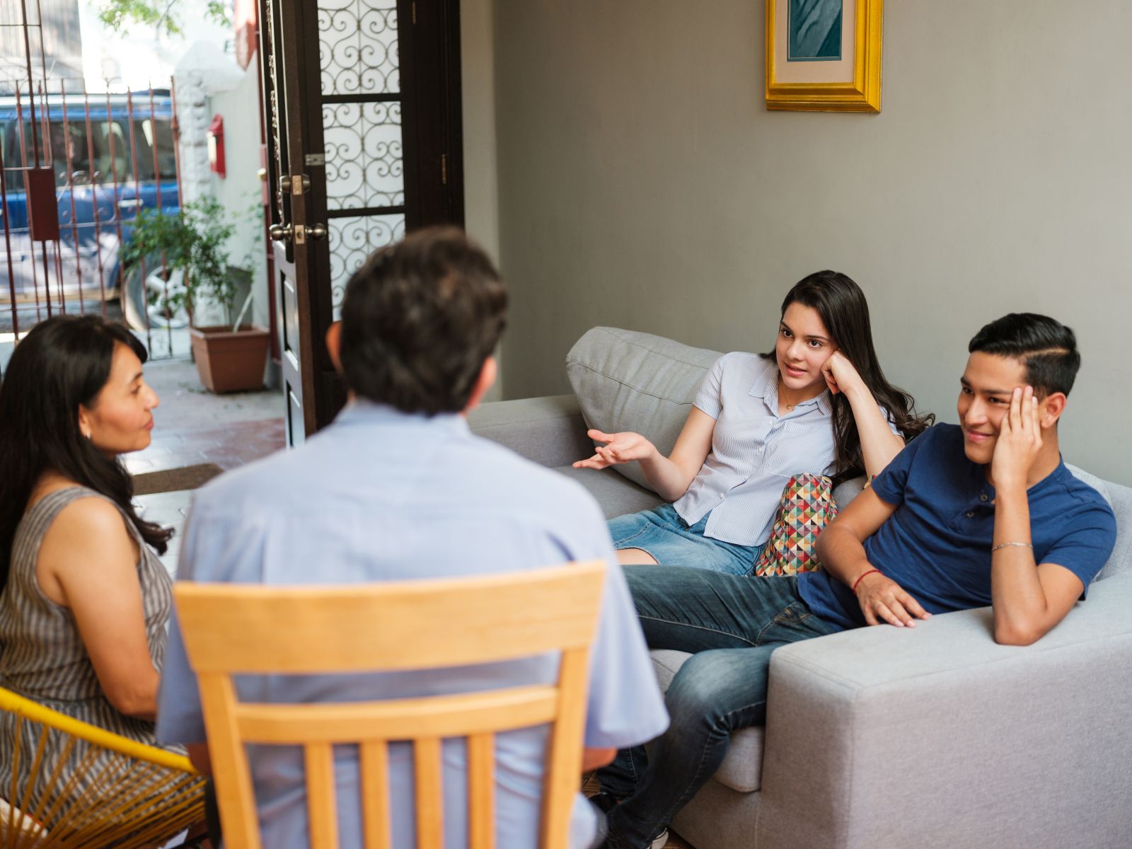 A family discussing an important issue, representing how to talk to your college student about drinking