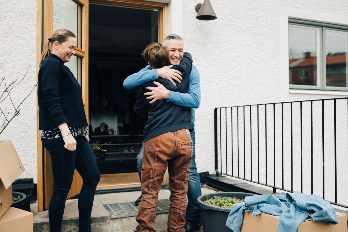 Parents greet their college student home for summer