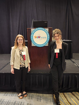 Two individuals at a conference